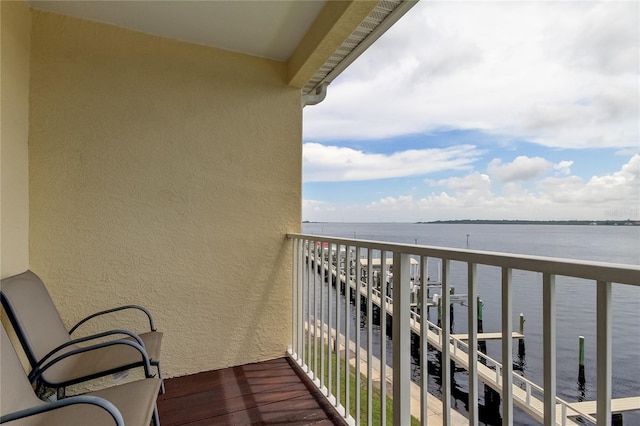 balcony featuring a water view