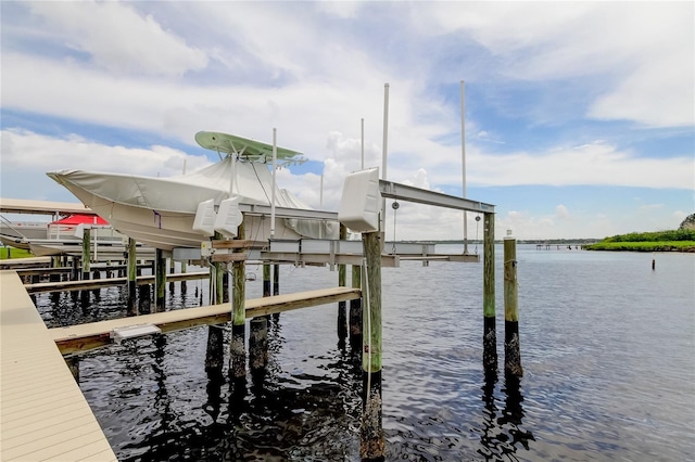 view of dock with a water view