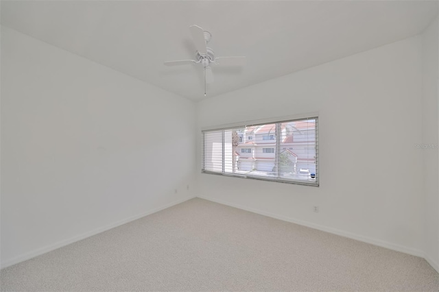 unfurnished room with carpet floors and ceiling fan