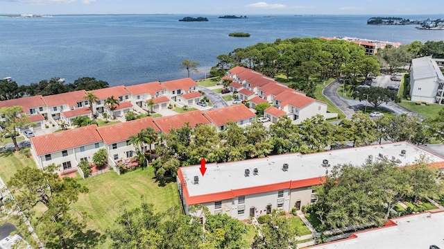 bird's eye view featuring a water view and a residential view