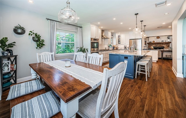 dining area with dark wood-type flooring