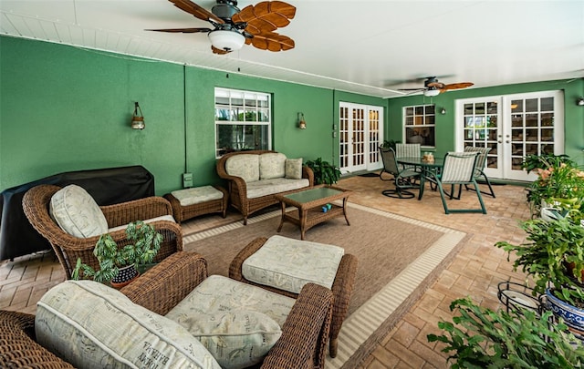 exterior space with ceiling fan and french doors