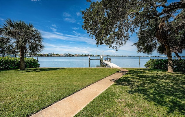 property view of water with a dock