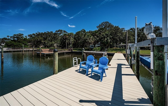 view of dock with a water view