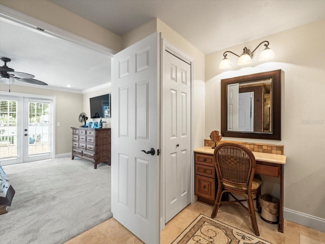 bathroom with crown molding, vanity, and ceiling fan