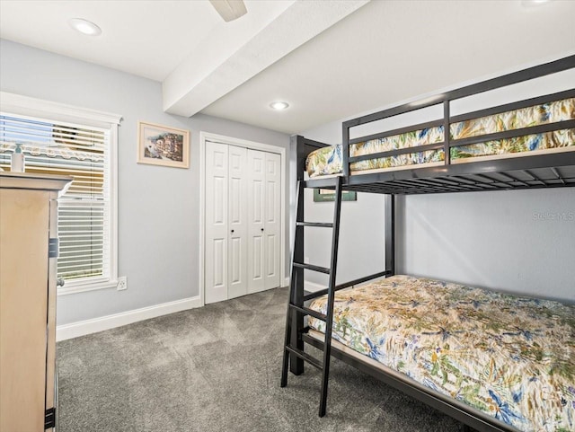 carpeted bedroom featuring a closet