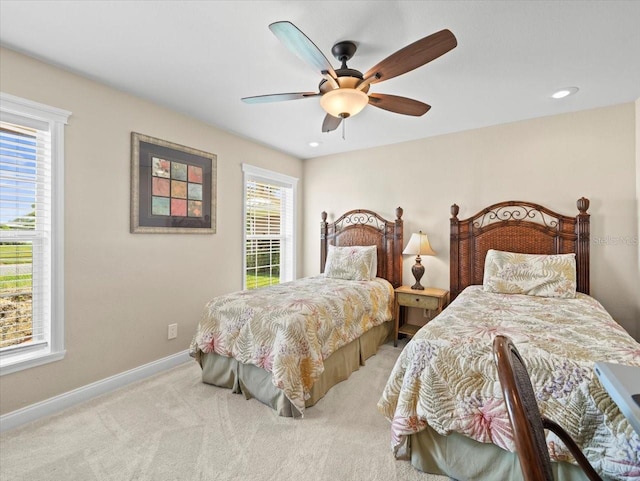 bedroom featuring ceiling fan and carpet floors