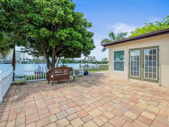 view of patio / terrace with a water view