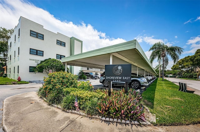 view of building exterior with a carport