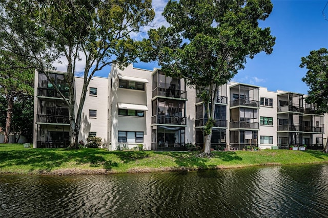 view of property with a water view