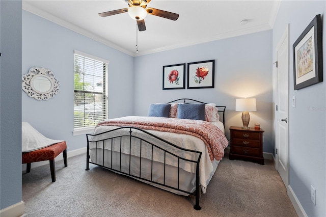 bedroom with ceiling fan, carpet flooring, and crown molding