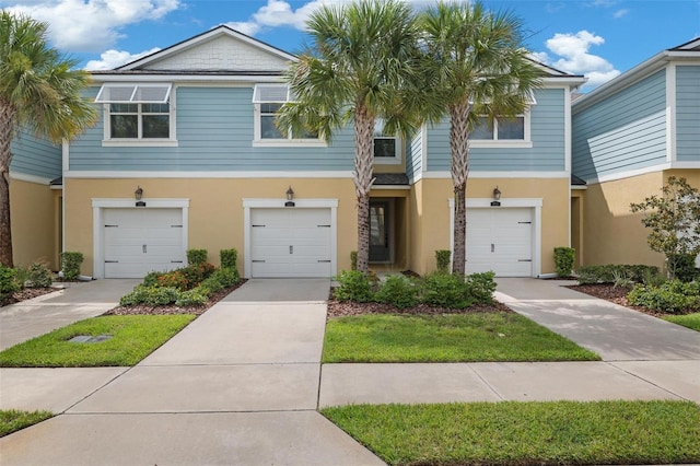 view of property featuring a garage