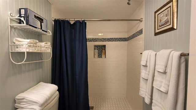 full bath featuring a shower stall