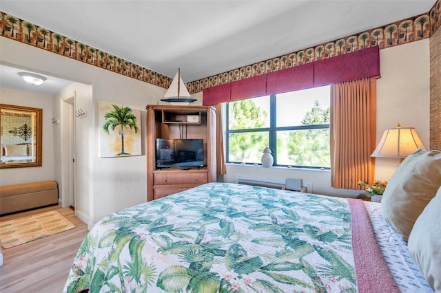 bedroom featuring light hardwood / wood-style floors