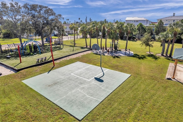 view of basketball court with a playground and a yard