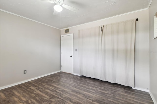 empty room with ceiling fan, hardwood / wood-style flooring, and ornamental molding