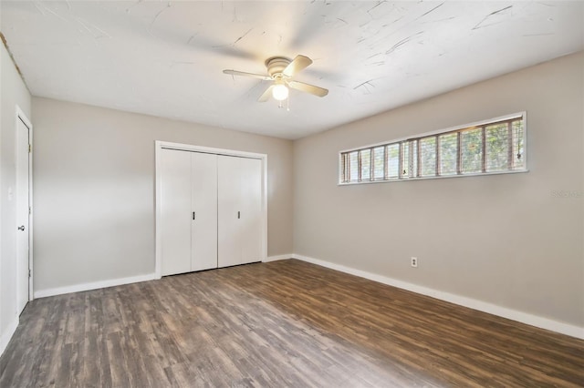 unfurnished bedroom with a closet, ceiling fan, and hardwood / wood-style floors