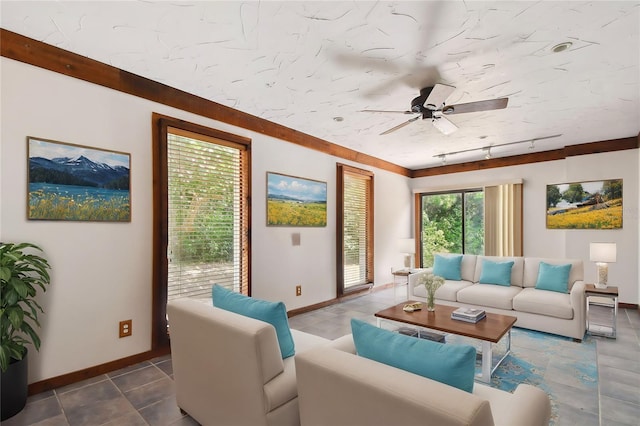 tiled living room with ceiling fan