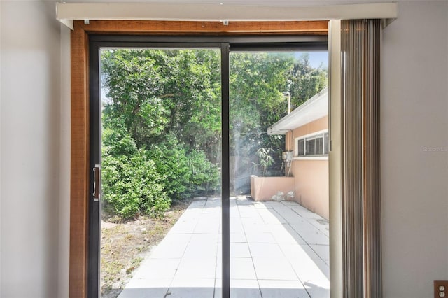 doorway to outside featuring plenty of natural light