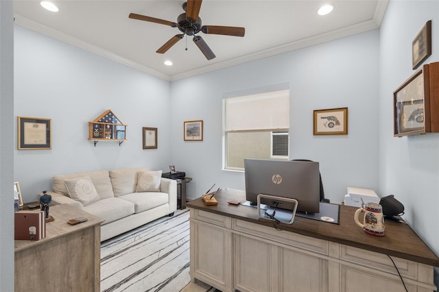 home office with ceiling fan and ornamental molding