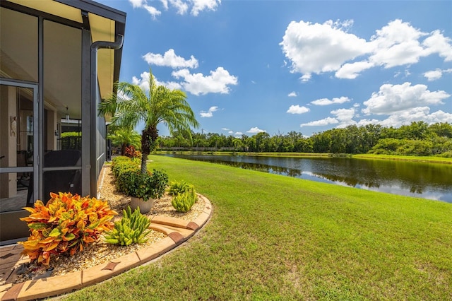 view of yard with a water view