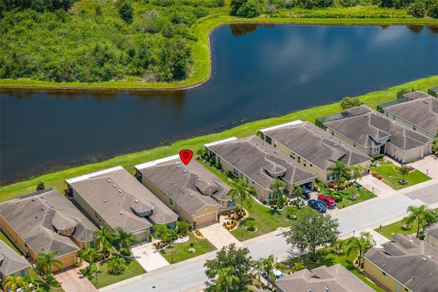 drone / aerial view featuring a water view