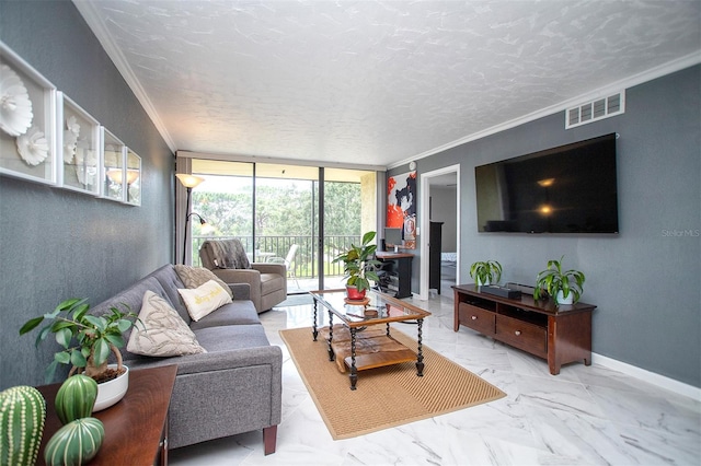 living room with a textured ceiling, expansive windows, ornamental molding, and tile patterned floors