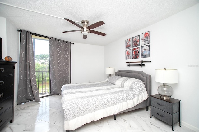 tiled bedroom with ceiling fan, a textured ceiling, and access to exterior