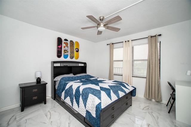 bedroom with a textured ceiling, ceiling fan, and light tile patterned flooring