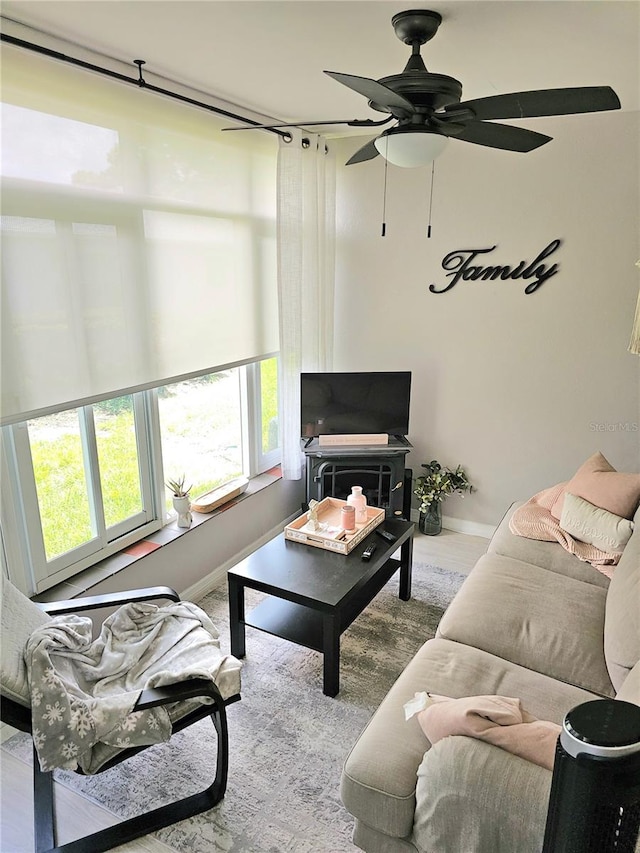 living room featuring ceiling fan