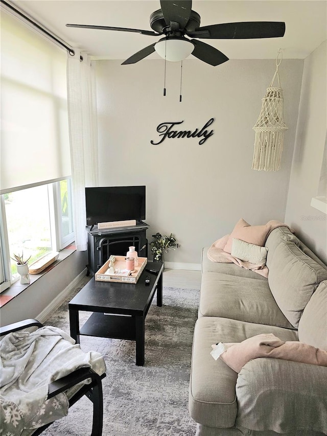 living room with ceiling fan