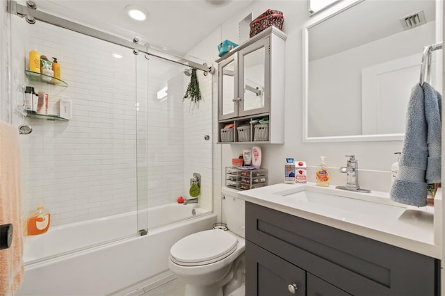 bathroom featuring vanity, toilet, visible vents, and shower / bath combination with glass door