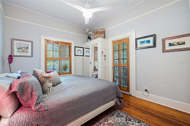 bedroom with ceiling fan, hardwood / wood-style floors, and access to exterior