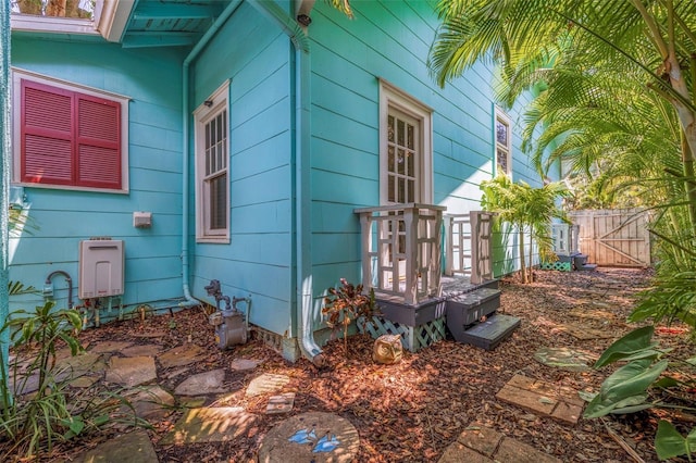 view of side of property with fence