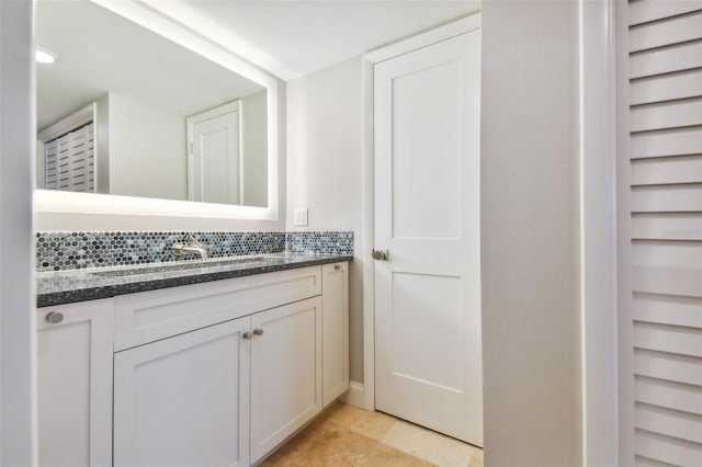 bathroom with vanity and tile patterned flooring