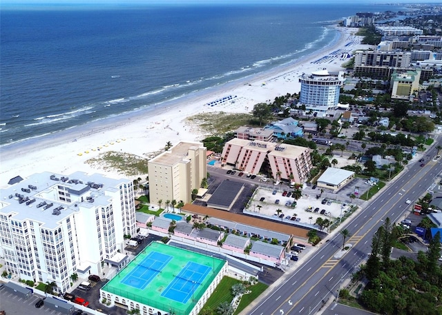 birds eye view of property featuring a water view and a view of the beach