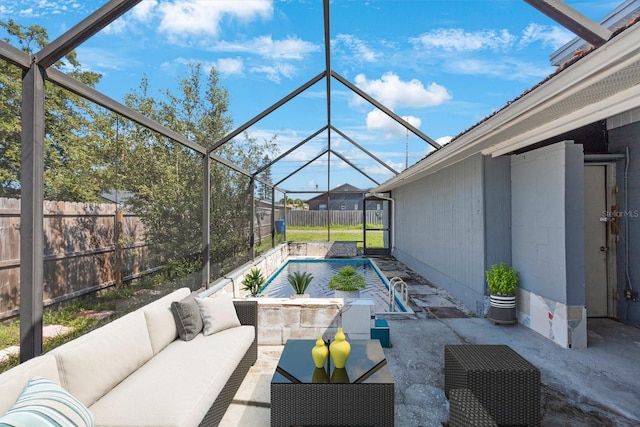 view of patio with outdoor lounge area and a lanai