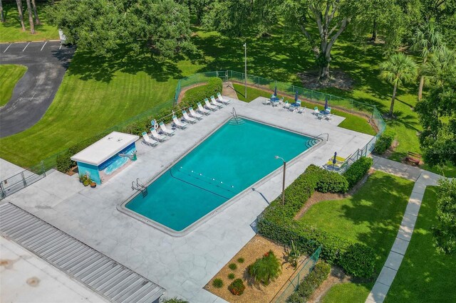 view of swimming pool with a patio area