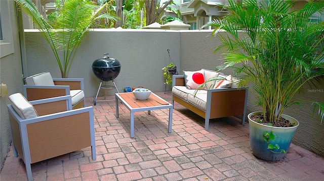 view of patio / terrace featuring a grill and outdoor lounge area