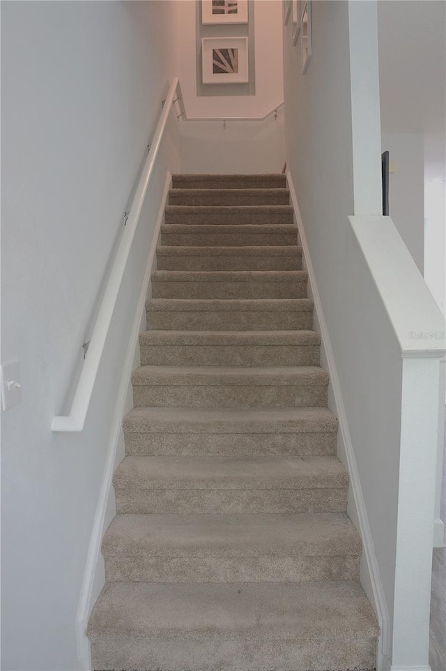 stairs with carpet floors