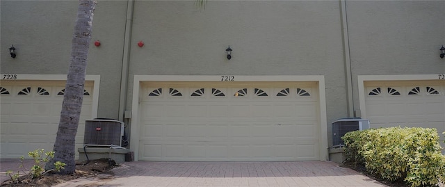 garage with central AC unit