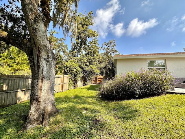 view of yard with fence