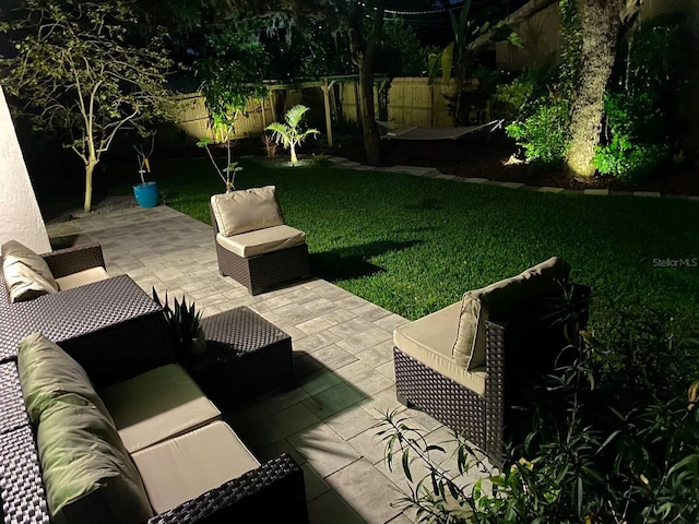 view of patio with outdoor lounge area and a fenced backyard