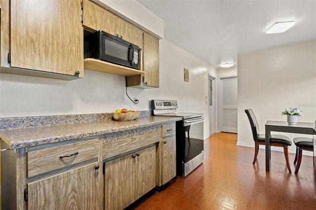 kitchen featuring electric range