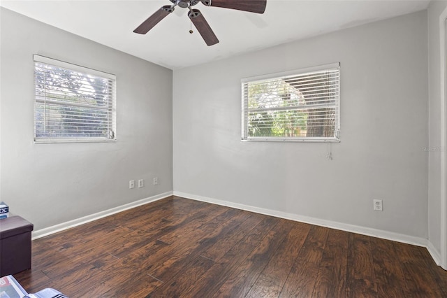 empty room featuring hardwood / wood-style floors and ceiling fan