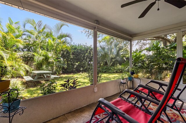 sunroom / solarium with ceiling fan