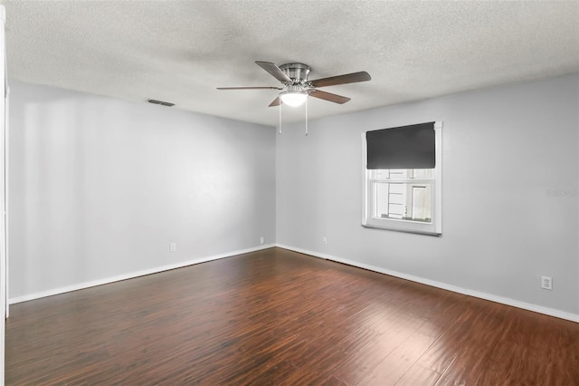 spare room featuring a textured ceiling, ceiling fan, and hardwood / wood-style floors