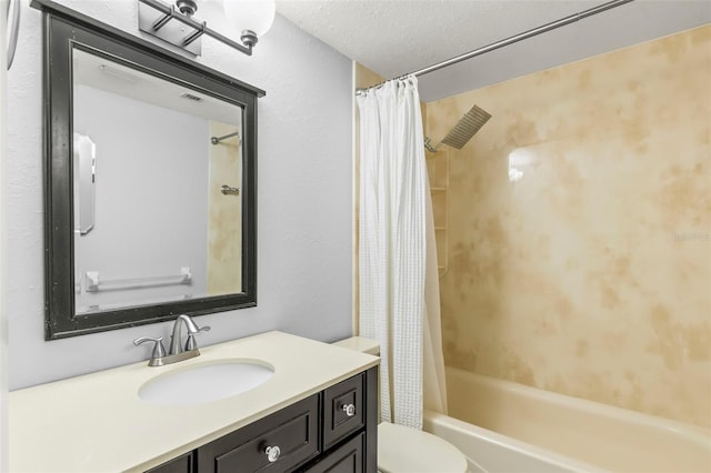 full bathroom with a textured ceiling, toilet, vanity, and shower / bath combo with shower curtain