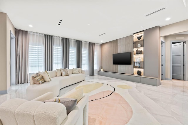 living room with light tile patterned floors