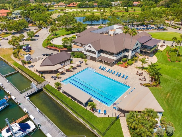 bird's eye view featuring a water view and a residential view